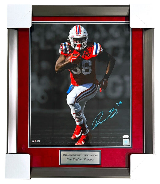 Rhamondre Stevenson New England Patriots Unsigned Makes a 30-Yard Touchdown  Photograph